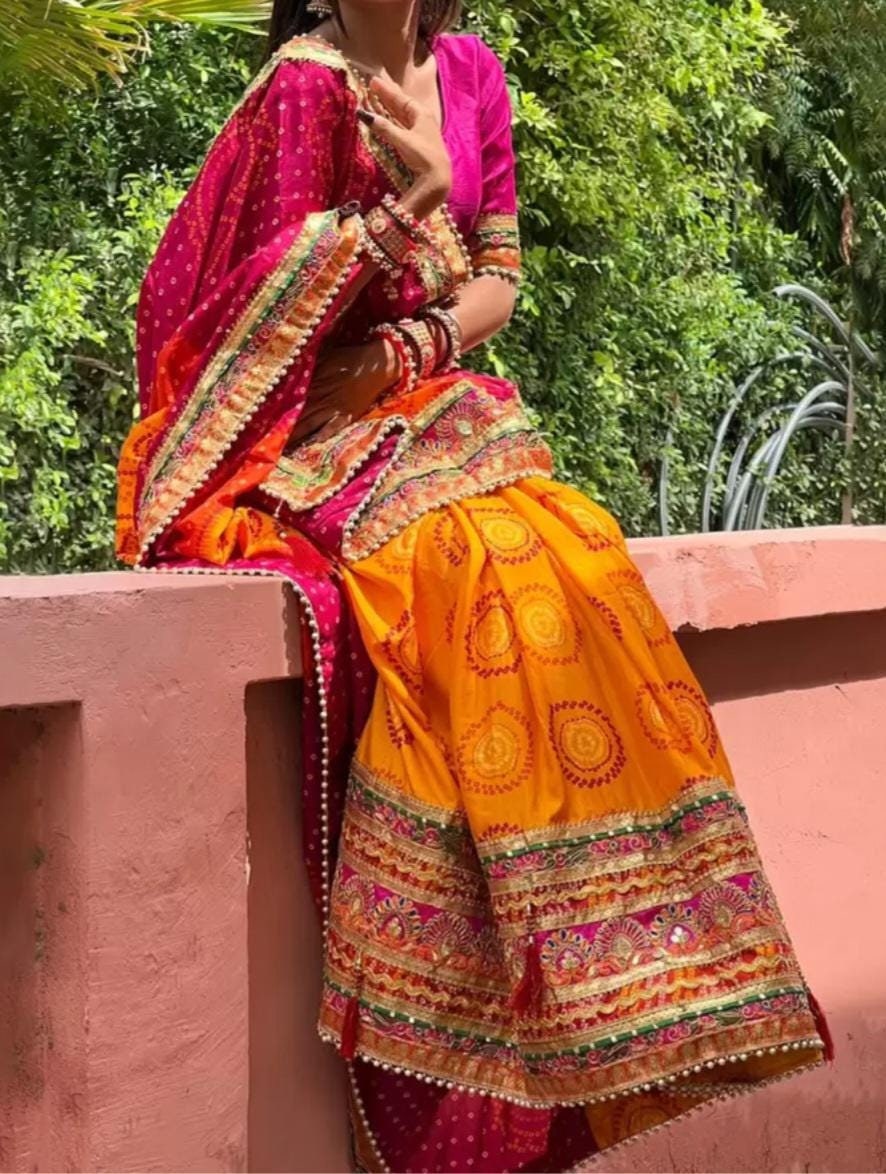 Orange and Pink Printed & Embroidered Pure Chiffon Bandhani Saree, with embroidered border, FREE Matching Petticoat.
