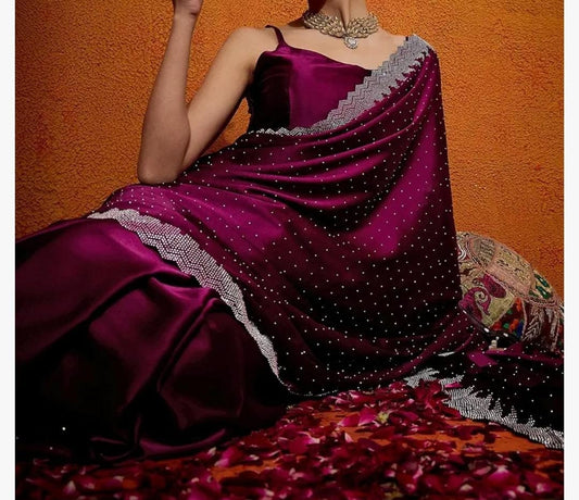 Premium Wine Satin Bollywood Saree with Self Design Embroidered Butti Work Featuring Sequined Less Border Ideal for Wedding Festive Wear