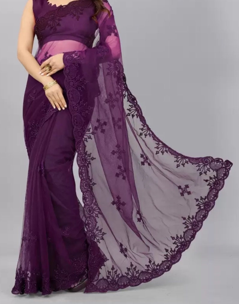 Ethnic Motifs Embroidered Net Saree, Purple Net Saree, Saree with FREE Matching Petticoat.
