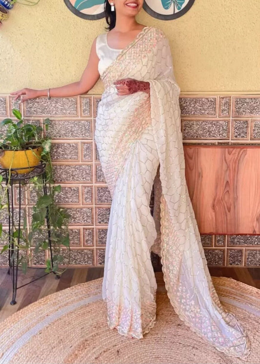 Off White Embellished Sequined Poly Georgette Saree with Detailed Border Ideal for Wedding Wear Pooja Wear Festive Occasions