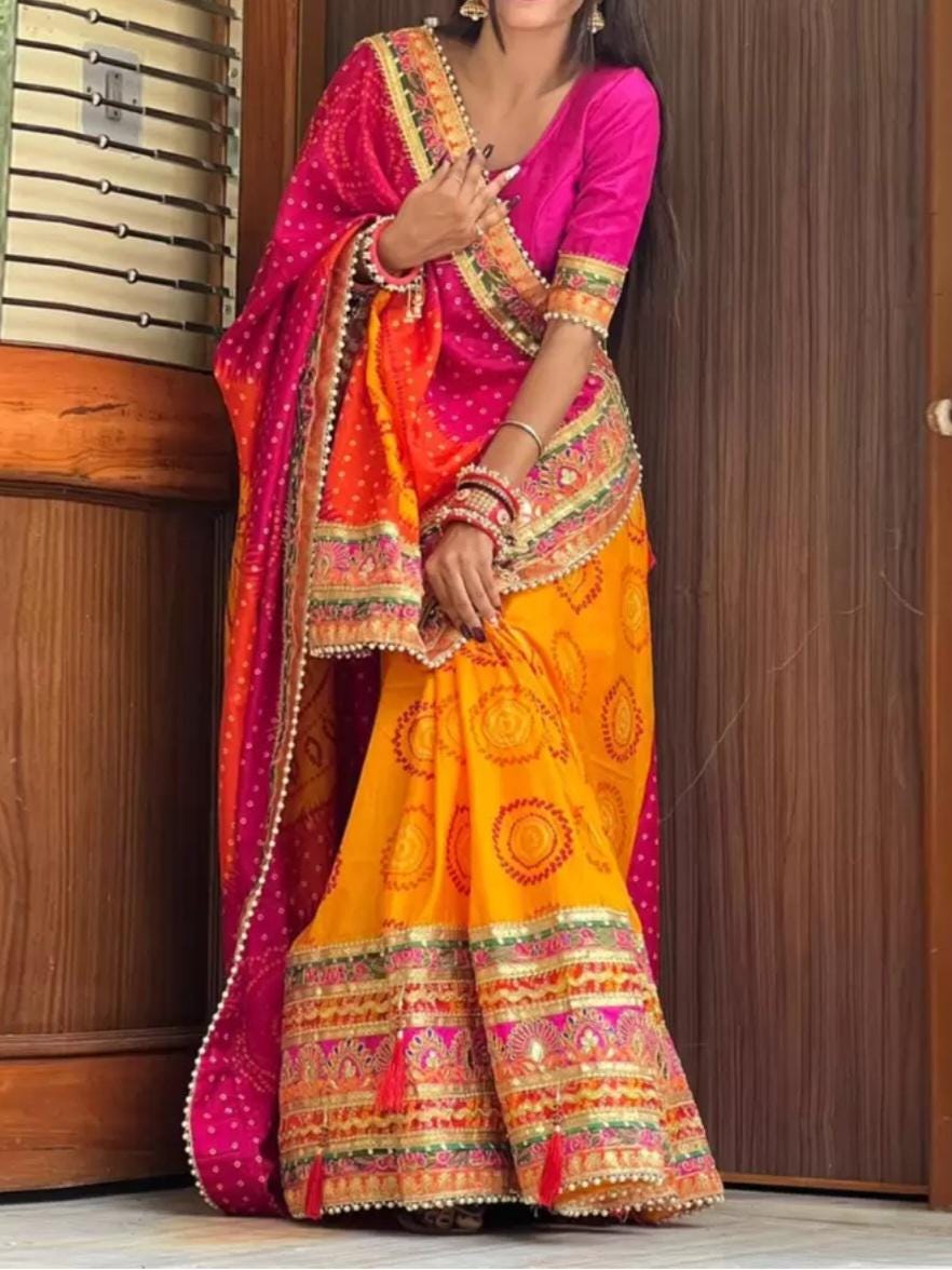 Orange and Pink Printed & Embroidered Pure Chiffon Bandhani Saree, with embroidered border, FREE Matching Petticoat.